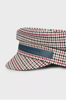 Checkered cap with leather logo
