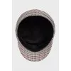 Checkered cap with leather logo