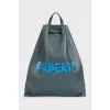 Green leather backpack with signature print