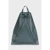 Green leather backpack with signature print