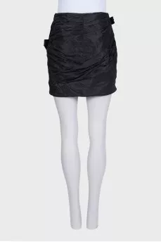 Silk mini skirt decorated with bows