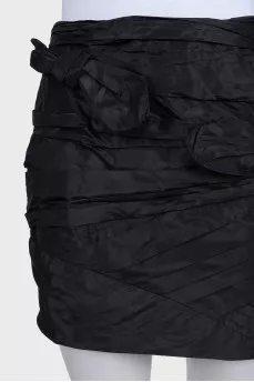 Silk mini skirt decorated with bows