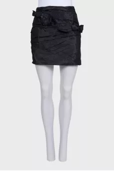 Silk mini skirt decorated with bows