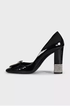 Patent leather shoes decorated with rhinestones