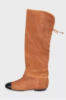 Leather boots with perforations and lacing