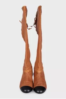 Leather boots with perforations and lacing