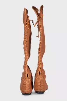 Leather boots with perforations and lacing