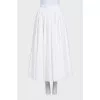 Voluminous white pleated skirt