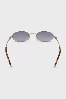Oval sunglasses with gold temples