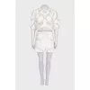 Beige suit with shorts decorated with perforations
