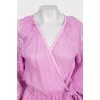 Fitted wrap dress decorated with embroidery