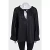 Loose black blouse