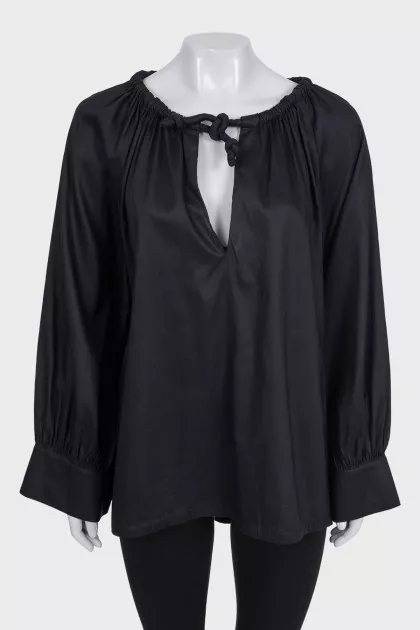Loose black blouse