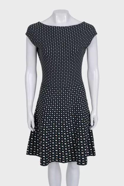 Fitted black dress with a print