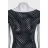 Fitted black dress with a print