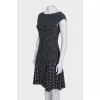Fitted black dress with a print