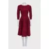 Fitted black dress with a voluminous print