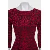 Fitted black dress with a voluminous print