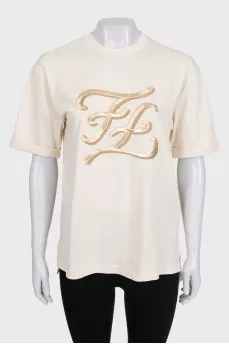 Beige T-shirt with gold embroidery