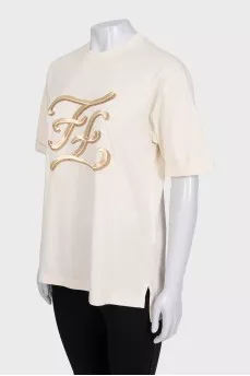 Beige T-shirt with gold embroidery
