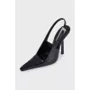 Black leather slingbacks with silver hardware