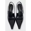 Black leather slingbacks with silver hardware