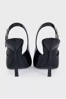 Black leather slingbacks with silver hardware