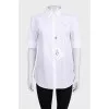 White short sleeve shirt with tag