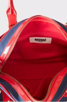 Сумка через плече синього кольору із нашивкою