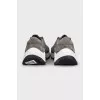 Gray sneakers made of suede and shiny fabric