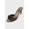 Brown heeled mules with a signature print