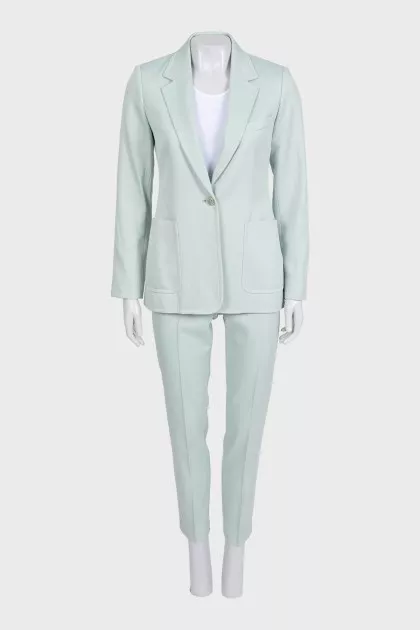 Green straight-cut suit with tag