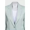 Green straight-cut suit with tag