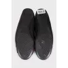 Green leather ballet flats with signature embellishments