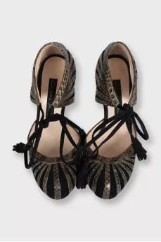 Black suede shoes with snakeskin inserts