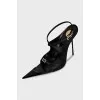 Black pointed-toe sandals