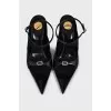 Black pointed-toe sandals