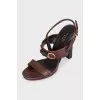 Leather heeled sandals with gold embellishments