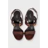 Leather heeled sandals with gold embellishments