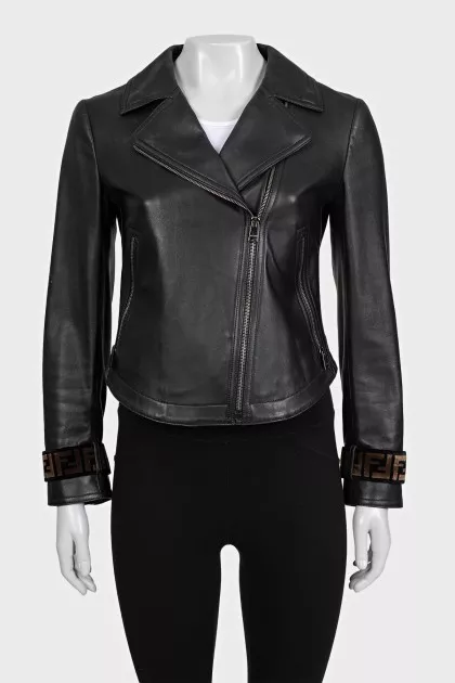 Black leather jacket with textile inserts on the sleeves