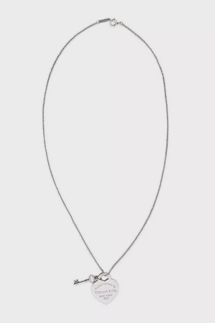 Silver pendant with a signature pendant
