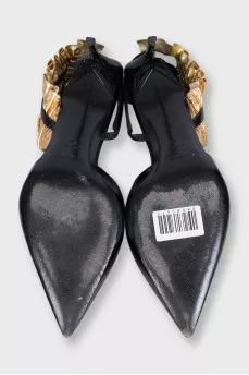 Leather slingbacks with embellishments on the back