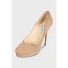 Brown suede high heel shoes