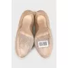 Brown suede high heel shoes