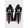 Patent black shoes with a wide strap
