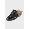 Black leather mules lined with fur