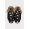 Black leather mules lined with fur