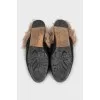 Black leather mules lined with fur