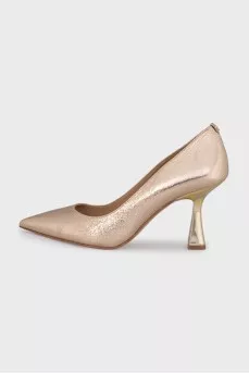 Leather shiny shoes with gold heels