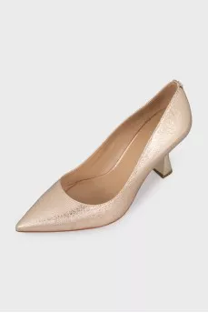 Leather shiny shoes with gold heels